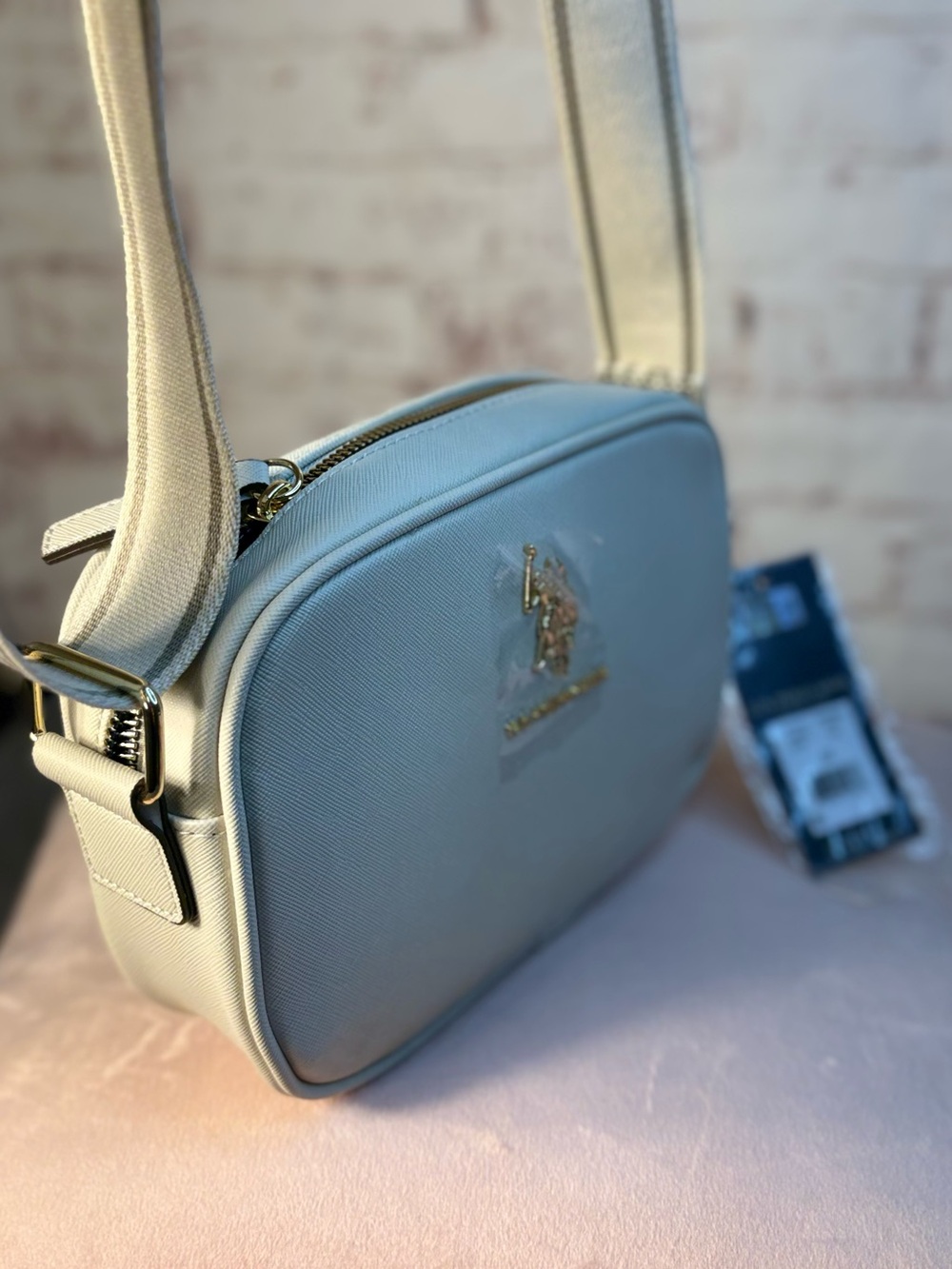 U.S. Polo Assn. Cream Saffiano Crossbody Bag with Wide Strap - Picture 3 of 16